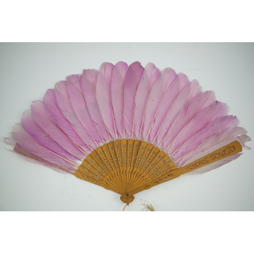 1532 - Three 19th century Chinese feather fans: One a carved bone brise black feather fan together with two... 