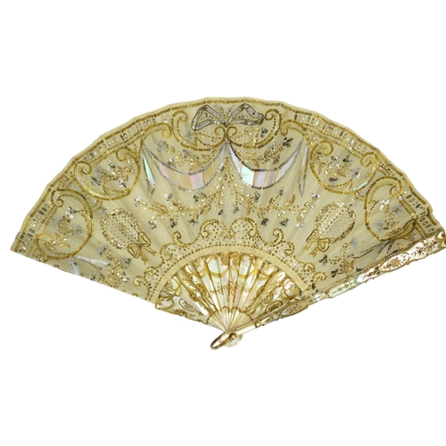 1540 - Three French fans: a mother of pearl and sequin fan boxed, a painted silk, feather and bone fan and ... 