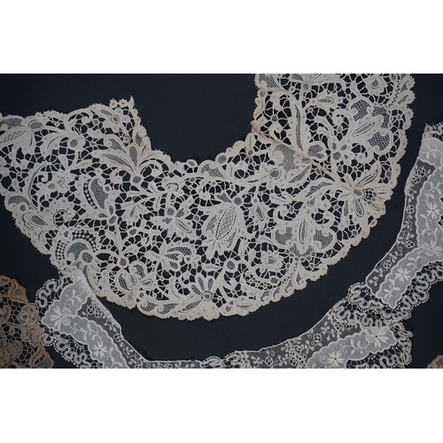 1542 - A variety of 19th and 20th century cream lace, being mixed hand and machine collars, lappets, trimmi... 