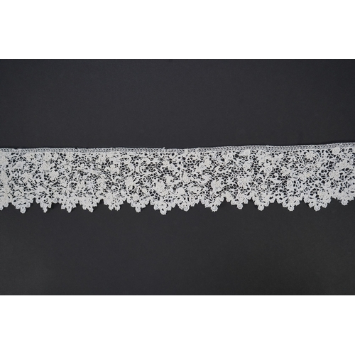 1548 - A late 17th century wide flounce of Point de France needle lace, together with a narrower flounce, b... 