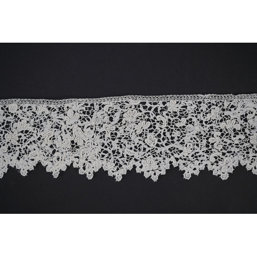 1548 - A late 17th century wide flounce of Point de France needle lace, together with a narrower flounce, b... 