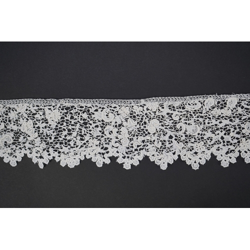 1548 - A late 17th century wide flounce of Point de France needle lace, together with a narrower flounce, b... 