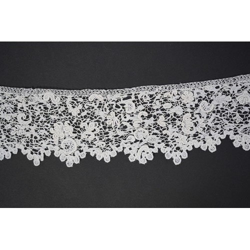 1548 - A late 17th century wide flounce of Point de France needle lace, together with a narrower flounce, b... 