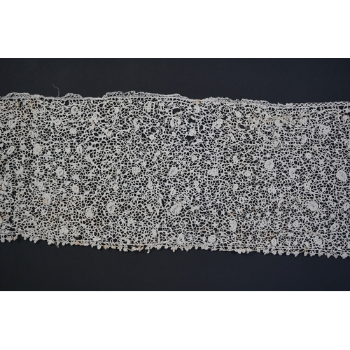 1548 - A late 17th century wide flounce of Point de France needle lace, together with a narrower flounce, b... 