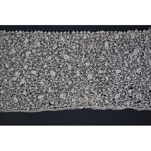 1548 - A late 17th century wide flounce of Point de France needle lace, together with a narrower flounce, b... 