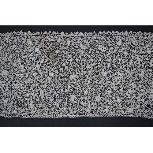 1548 - A late 17th century wide flounce of Point de France needle lace, together with a narrower flounce, b... 