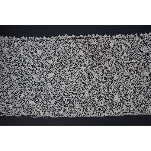 1548 - A late 17th century wide flounce of Point de France needle lace, together with a narrower flounce, b... 