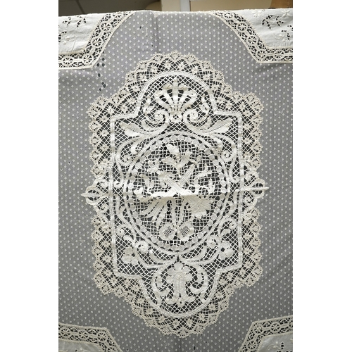 1558 - An ornate Edwardian bed cover, handmade from cut work anglaise panels, fine spot motif net and bobbi... 