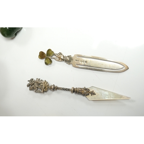 1826 - A small collection of mainly small silver items including a Victorian fruit knife, bookmarks, hare c... 