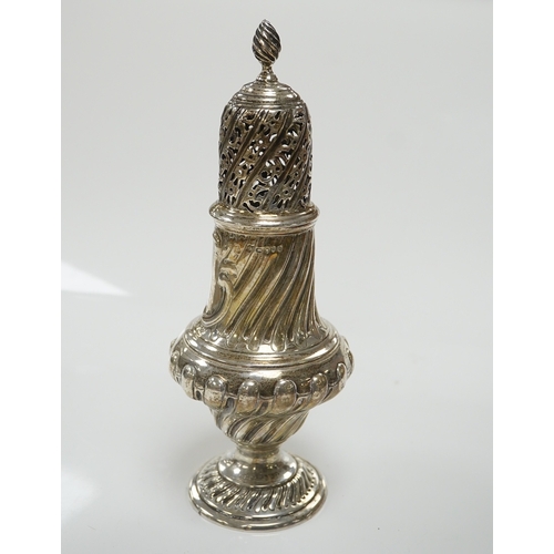 1858 - A Victorian repousse spiral fluted pedestal sugar caster, Thomas Bradbury & Sons, London, 1889, 18.3... 