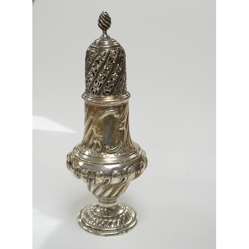 1858 - A Victorian repousse spiral fluted pedestal sugar caster, Thomas Bradbury & Sons, London, 1889, 18.3... 