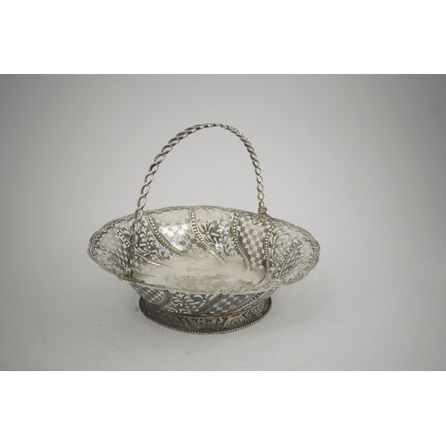 1861 - A late George II pierced silver cake basket, by William Plummer?, of shaped circular form, with engr... 