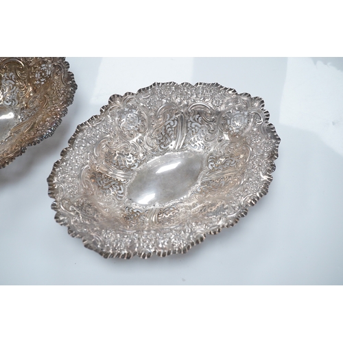 1863 - A pair of late Victorian pierced silver oval dishes, by Atkin Brothers, Sheffield, 1896, 27.9cm, 19.... 