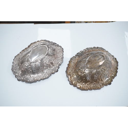 1863 - A pair of late Victorian pierced silver oval dishes, by Atkin Brothers, Sheffield, 1896, 27.9cm, 19.... 