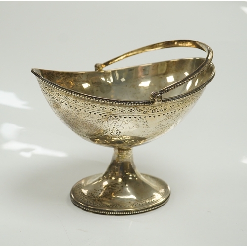 1872 - A Victorian engraved silver oval pedestal sugar basket, Henry Holland, London, 1869, width 15.5cm, 7... 