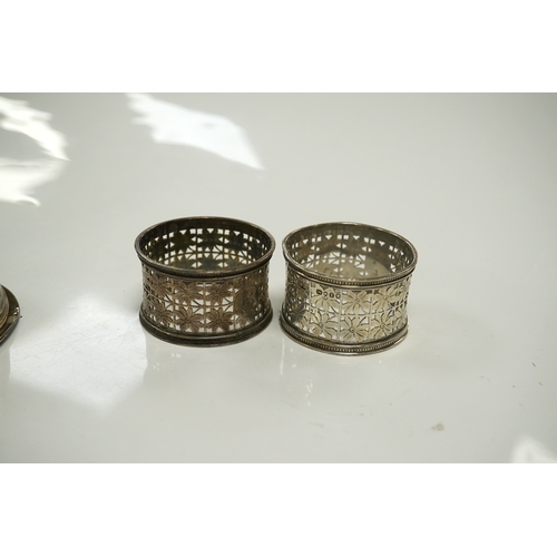 1879 - Two pairs of Victorian silver napkin rings and a George III silver wine funnel with later embossed d... 