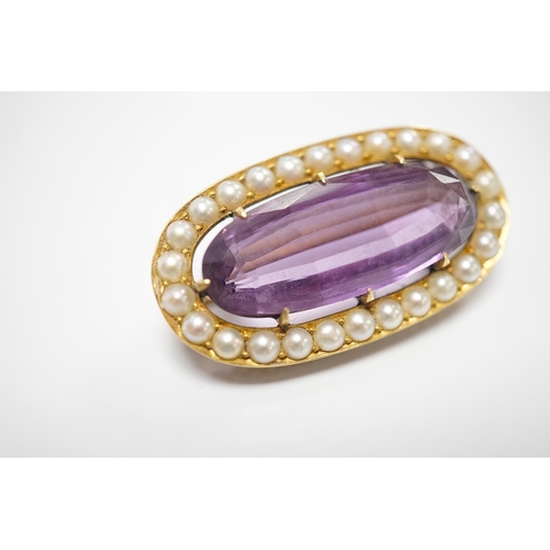 1901 - An early 20th century yellow metal mounted amethyst and split pearl cluster set oval brooch, 32mm, g... 