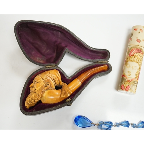 1904 - A small group of collectables including a cased Meerschaum pipe, a Dunhill lighter, a yellow metal m... 