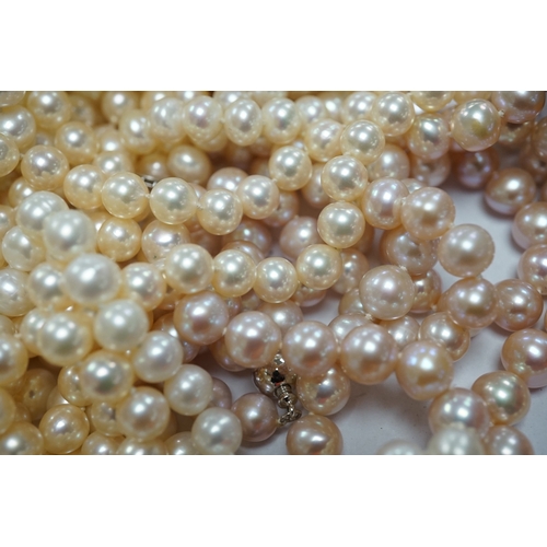 1907 - Six assorted modern single strand cultured pearl necklaces, one with 14k clasp, longest 86cm, a pair... 