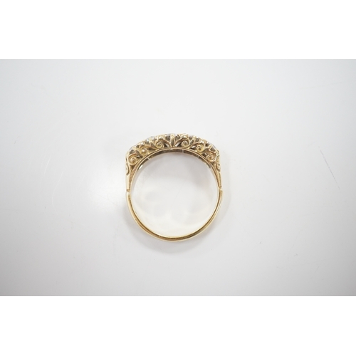 1909 - An early 20th century 18ct and graduated five stone diamond set half hoop ring, with rose cut diamon... 