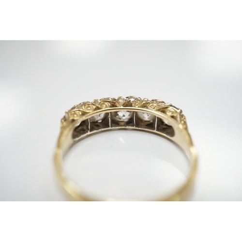 1909 - An early 20th century 18ct and graduated five stone diamond set half hoop ring, with rose cut diamon... 