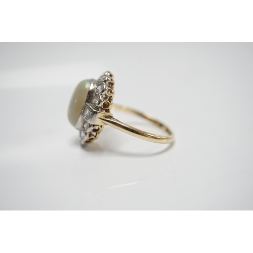 1911 - A mid 20th century 18ct, white opal, square and round cut diamond set oval cluster ring, size O, gro... 