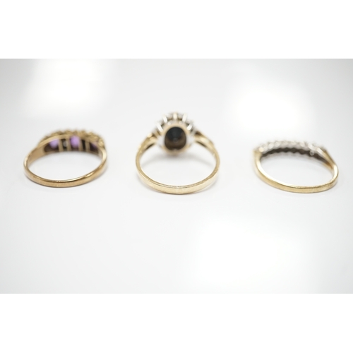 1912 - Three assorted 9ct and gem set rings including a diamond chip cluster half hoop and two pairs of yel... 