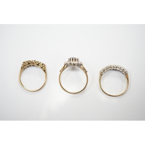 1912 - Three assorted 9ct and gem set rings including a diamond chip cluster half hoop and two pairs of yel... 