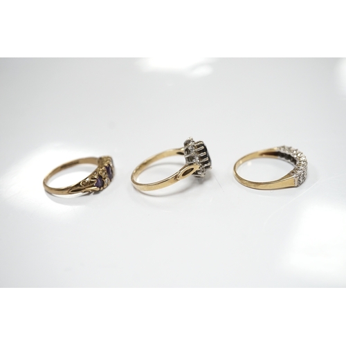 1912 - Three assorted 9ct and gem set rings including a diamond chip cluster half hoop and two pairs of yel... 