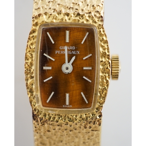 1914 - A lady's Girard Perregaux 18K cased wrist watch, with tiger's eye quartz dial, white hands and marke... 