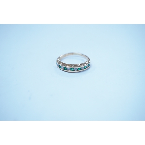 1927 - A modern 18k, seven stone emerald and six stone diamond set half hoop ring, size F/G, gross weight 2... 