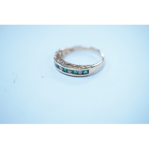 1927 - A modern 18k, seven stone emerald and six stone diamond set half hoop ring, size F/G, gross weight 2... 