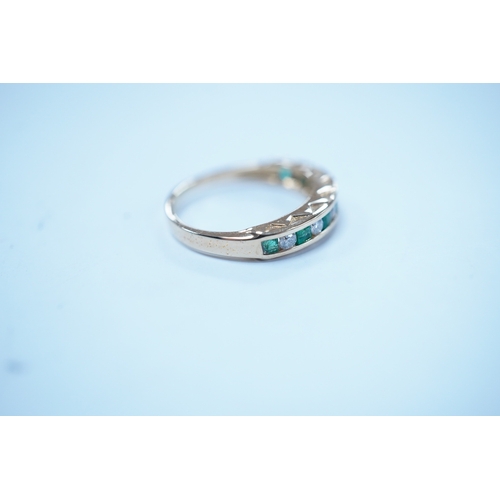 1927 - A modern 18k, seven stone emerald and six stone diamond set half hoop ring, size F/G, gross weight 2... 