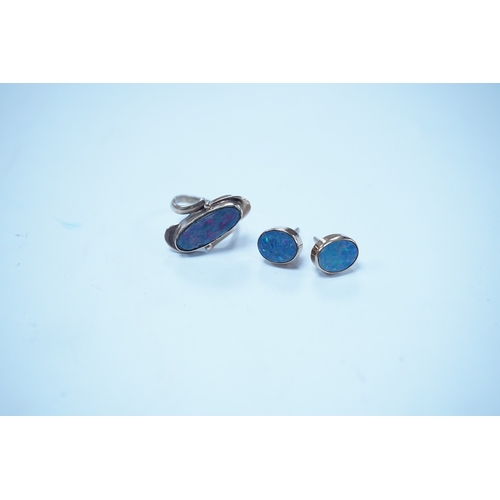 1931 - A 9ct and opal doublet ring and a pair of similar earrings, gross weight 4.8 grams. Condition - poor... 