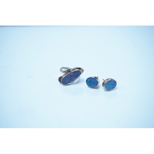 1931 - A 9ct and opal doublet ring and a pair of similar earrings, gross weight 4.8 grams. Condition - poor... 