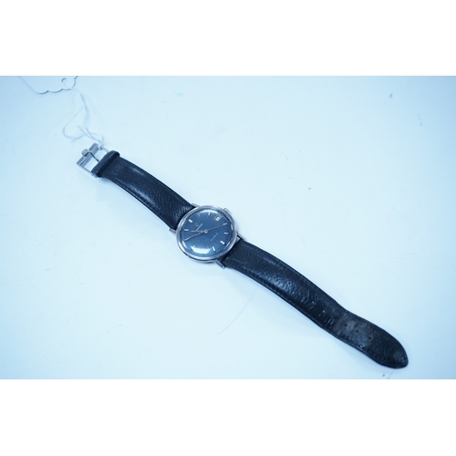 1934 - A gentleman's late 1960's stainless steel Omega manual wind wrist watch, with baton numerals and dat... 