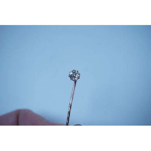 1939 - A yellow metal and solitaire diamond set stick pin, the stone diameter approx. 5mm, 59mm, gross weig... 