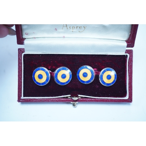 1949 - A modern pair of Asprey silver and two colour enamel set target disc cufflinks, in original Asprey b... 