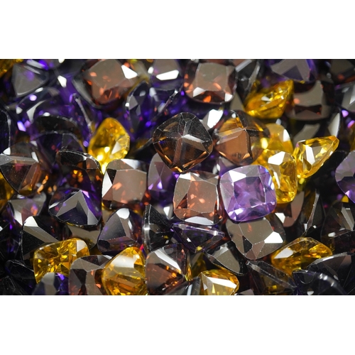 1953 - A quantity of assorted cut coloured cubic zirconia stones. Condition - poor to fair to good