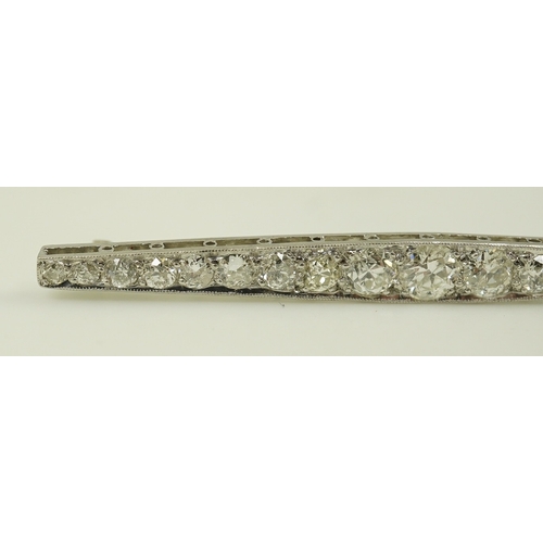 1967 - A 1920's platinum? and nineteen millegrain set graduated diamond bar brooch, 59mm, gross weight 4.6 ... 