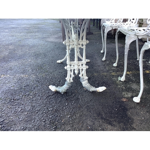 103 - A white painted cast aluminium garden table, width 183cm, depth 92cm, height 71cm, and six chairs. C... 