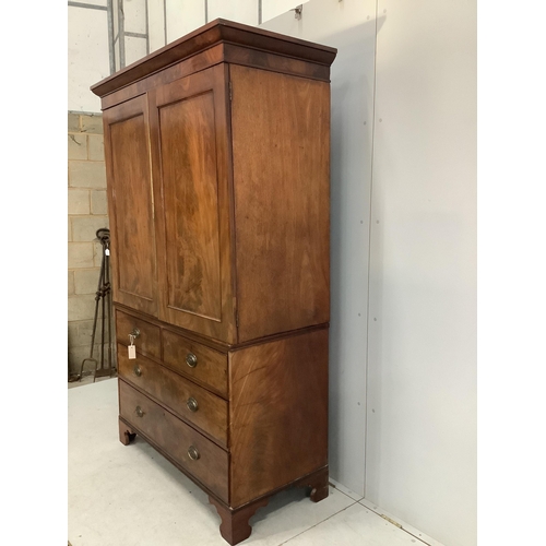 16 - A George III mahogany linen press converted to a hanging wardrobe, width 130cm, depth 58cm, height 2... 