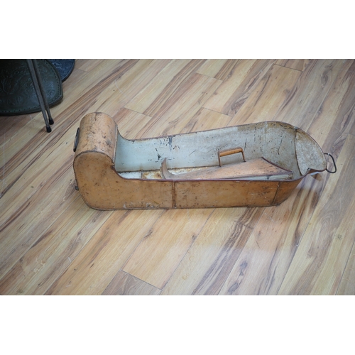 253 - A WWII tin leg bath, with cover and tap to foot end, length 88cm. Condition - poor to fair, surface ... 