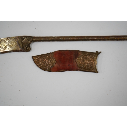 256 - An Indian axe bhuj, with broad curved blade, iron haft with elephant head top, all covered over with... 