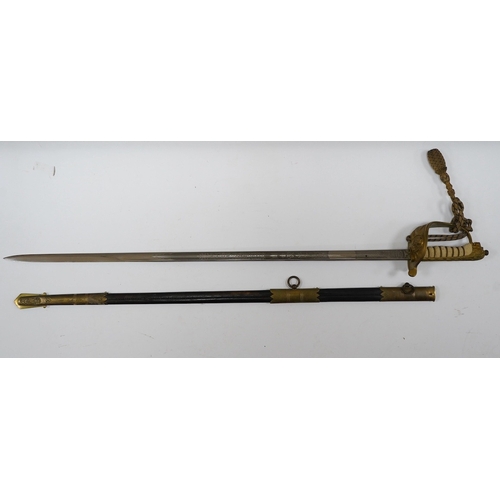 259 - A George VI naval officers dress sword by Wilkinson (unnumbered), with regulation brass hilt with f... 