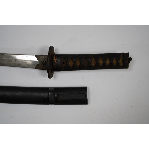 263 - A Japanese short sword wakizashi, blade 42.5cm unsigned, iron mokko tsuba with inlaid details, tape ... 