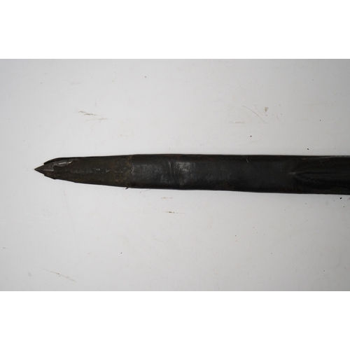 266 - A 19th century Continental hunting hanger, blade cut with twin fullers, recurved brass crosspiece wi... 