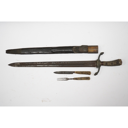 266 - A 19th century Continental hunting hanger, blade cut with twin fullers, recurved brass crosspiece wi... 