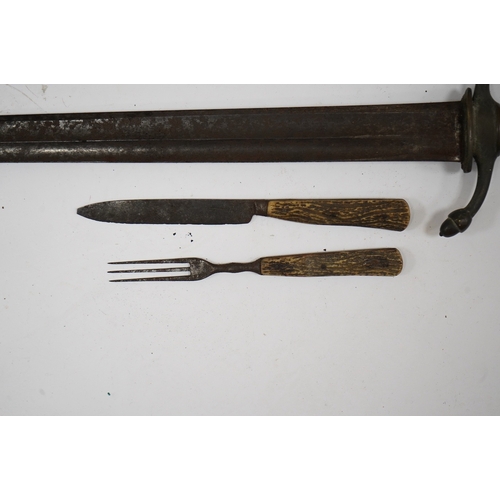 266 - A 19th century Continental hunting hanger, blade cut with twin fullers, recurved brass crosspiece wi... 