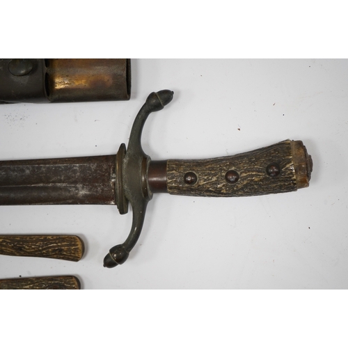 266 - A 19th century Continental hunting hanger, blade cut with twin fullers, recurved brass crosspiece wi... 